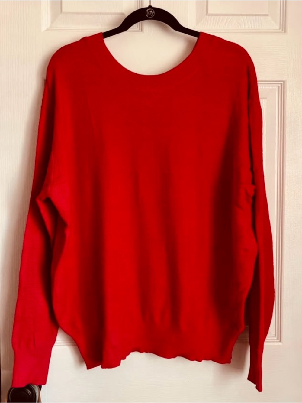 Red sweater with bow detail